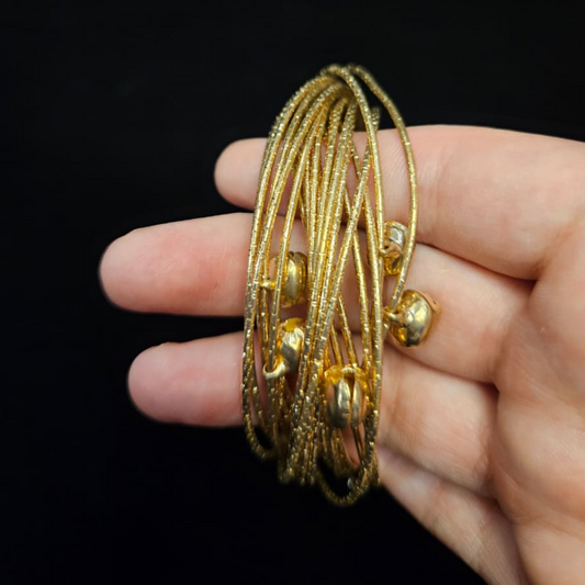 Thin Twisted Golden Bangles with Dangling Balls